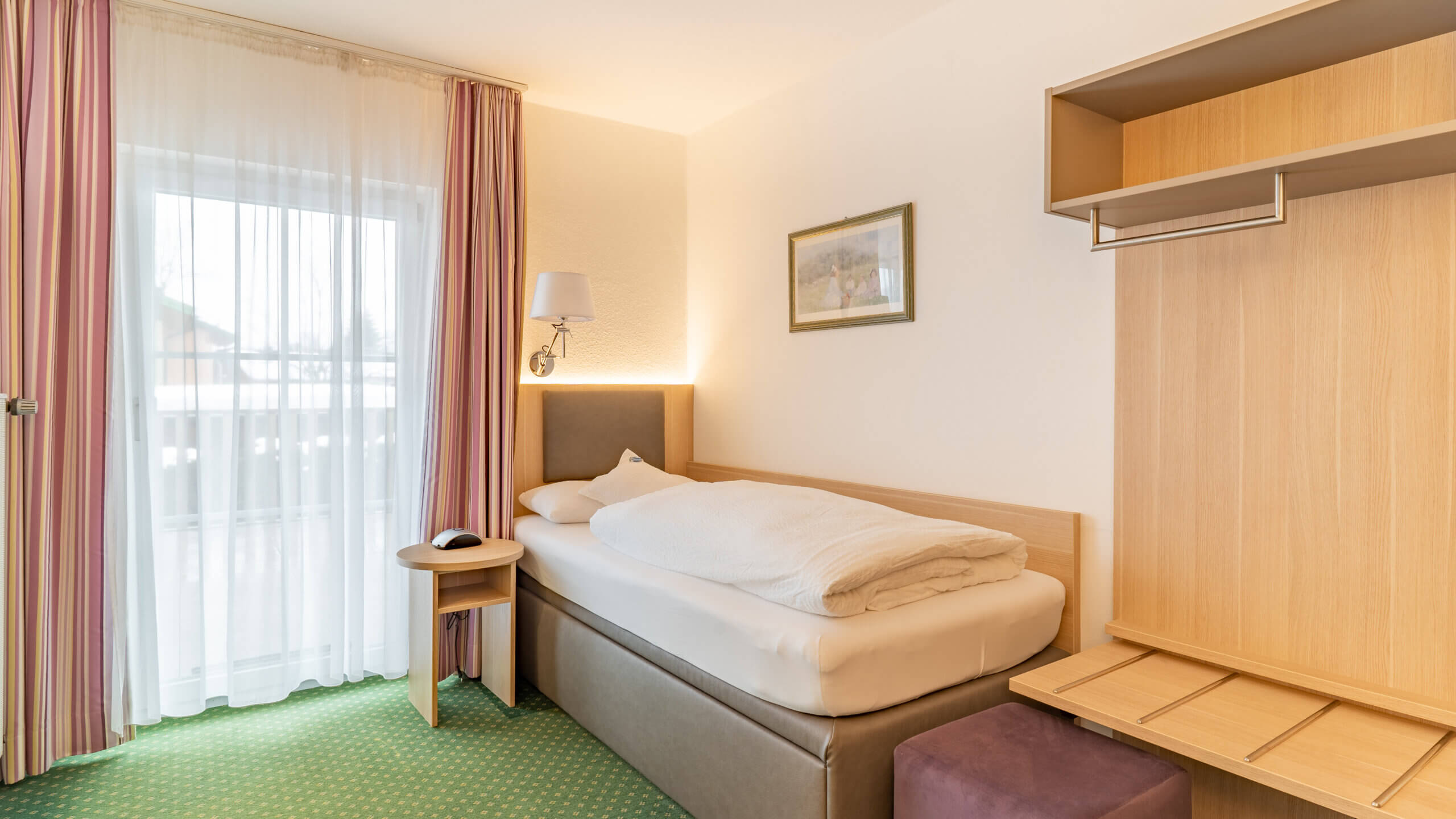 <p>Einzelbett in einer gemütlichen Nische</p>